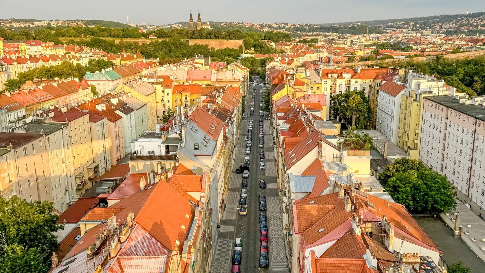 Aerial view of red-roofed Vinohrady residential street